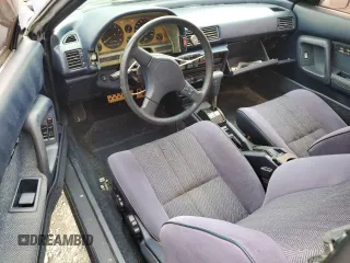 1988 Toyota Celica z VIN JT2ST67L0J7222767, wystawiony jako Copart lot #53647155 z przebiegiem 103 345 mil mil oraz Czysty tytuł • Clean title. Historia ofert i sprzedaży dostępna na DreamBid. Obrazek 8.