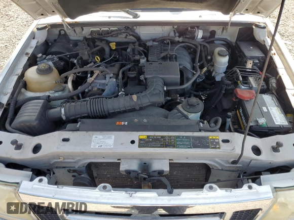 2010 Ford Ranger XL with VIN 1FTKR1AD4APA44985, listed as a Copart auction lot 59517295 with 57,541 mi miles and Salvage title. Bid and sale history available at DreamBid. Image 11.