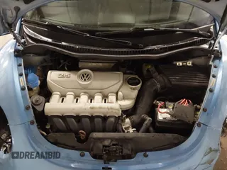 2010 Volkswagen New Beetle Coupe with VIN 3VWPW3AG4AM003893, listed as a IAAI auction lot 41255087 with 192,128 mi miles. Bid and sale history available at carsss.com. Image 10.