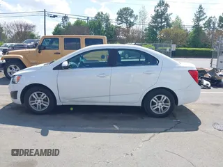 2014 Chevrolet Sonic LT with VIN 1G1JC5SH0E4232070, listed as a IAAI auction lot 41970353 with 140,557 mi miles and . Bid and sale history available at DreamBid. Image 14.