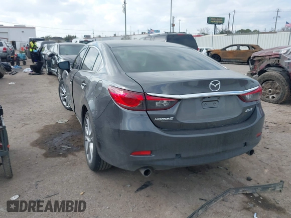 2017 Mazda 6 Touring with VIN JM1GL1V57H1127804, listed as a IAAI auction lot 41515342 with 107,336 mi miles and . Bid and sale history available at carsss.com. Image 3.