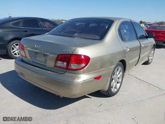 2002 Infiniti I35 Luxury with VIN JNKDA31A12T029546, listed as a IAAI auction lot 41853216 with 89,911 mi miles. Bid and sale history available at carsss.com. Image 4.