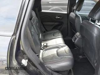 2014 Jeep Cherokee Trailhawk z VIN 1C4PJMBB1EW145683, wystawiony jako IAAI lot #42487730 z przebiegiem 148 277 mil mil oraz . Historia ofert i sprzedaży dostępna na DreamBid. Obrazek 8.
