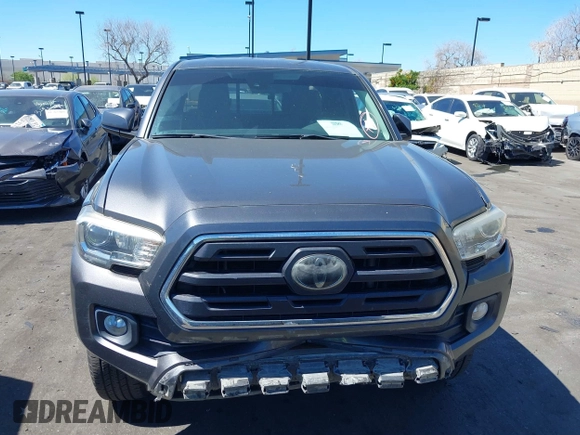 2018 Toyota Tacoma SR with VIN 5TFRX5GN1JX118441, listed as a IAAI auction lot 41870266 with 95,612 mi miles and . Bid and sale history available at DreamBid. Image 13.