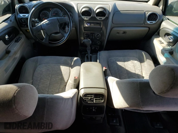 2004 GMC Envoy SLT with VIN 1GKDT13S542243359, listed as a Copart auction lot 79068994 with 199,062 mi miles and Salvage Title. Bid and sale history available at carsss.com. Image 8.