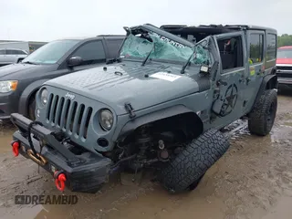 2014 Jeep Wrangler Unlimited Sport with VIN 1C4BJWDG1EL135073, listed as a IAAI auction lot 42435361 with 129,144 mi miles and . Bid and sale history available at DreamBid. Image 6.