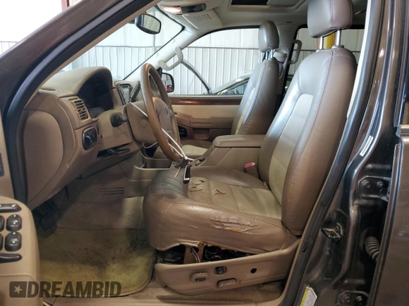 2005 Ford Explorer Eddie Bauer with VIN 1FMDU74E75UA91770, listed as a Copart auction lot 67545334 with 143,950 mi miles and Salvage title. Bid and sale history available at DreamBid. Image 7.
