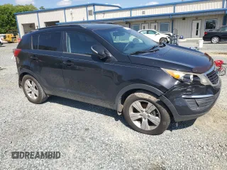 2011 Kia Sportage LX with VIN KNDPB3A29B7153383, listed as a Copart auction lot 52118075 with 191,742 mi miles and Salvage Title. Bid and sale history available at carsss.com. Image 4.