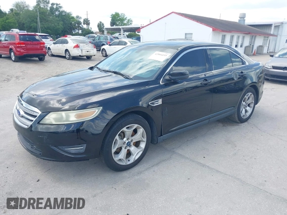 2012 Ford Taurus SEL with VIN 1FAHP2EW8CG113879, listed as a IAAI auction lot 42004495 with 194,952 mi miles and . Bid and sale history available at DreamBid. Image 2.