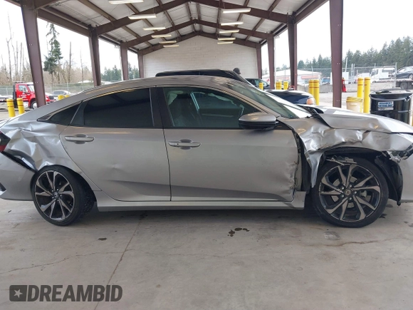 2021 Honda Civic Sport with VIN 2HGFC2F83MH521470, listed as a IAAI auction lot 41828890 with 49,703 mi miles and . Bid and sale history available at DreamBid. Image 13.