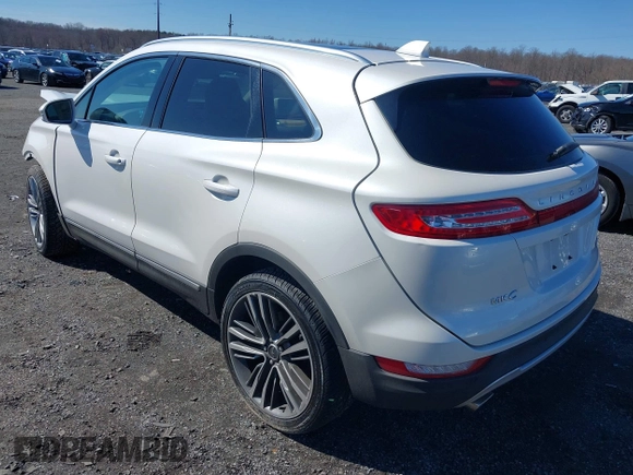 2015 Lincoln MKC with VIN 5LMTJ2AH8FUJ31911, listed as a IAAI auction lot 41735017 with 76,332 mi miles. Bid and sale history available at carsss.com. Image 3.