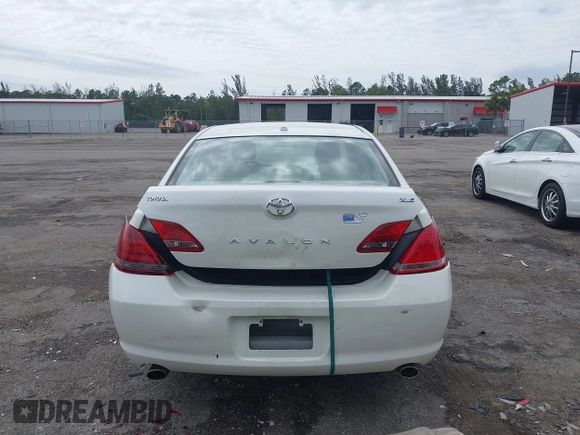 2010 Toyota Avalon XL with VIN 4T1BK3DB8AU354533, listed as a IAAI auction lot 41802797 with 117,956 mi miles and . Bid and sale history available at carsss.com. Image 16.