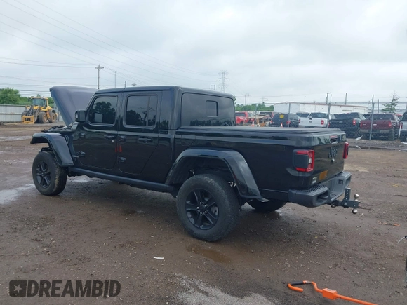 2023 Jeep Gladiator Overland with VIN 1C6JJTFM9PL593659, listed as a IAAI auction lot 42470253 with 34,374 mi miles and . Bid and sale history available at DreamBid. Image 3.