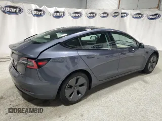 2022 Tesla Model 3 with VIN 5YJ3E1EA8NF287506, listed as a Copart auction lot 55674145 with 106,745 mi miles and Clean Title. Bid and sale history available at DreamBid. Image 3.