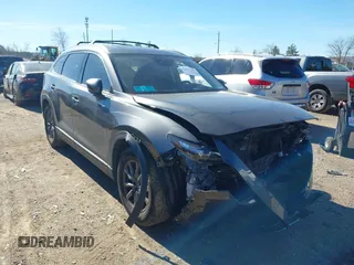 2021 Mazda CX-9 Touring z VIN JM3TCACY4M0509579, wystawiony jako IAAI lot #41661307 z przebiegiem 101 629 mil mil oraz . Historia ofert i sprzedaży dostępna na DreamBid. Obrazek 1.
