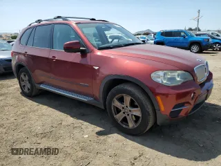 2011 BMW X5 35d with VIN 5UXZW0C56BL661903, listed as a Copart auction lot 62216795 with 146,045 mi miles and Clean title. Bid and sale history available at DreamBid. Image 4.