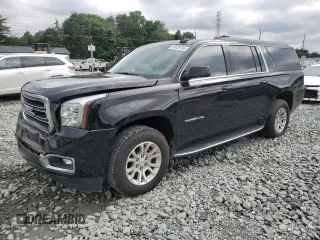 2017 GMC Yukon XL SLT with VIN 1GKS2GKC0HR389334, listed as a Copart auction lot 58639765 with 86,673 mi miles and Salvage title. Bid and sale history available at DreamBid. Image 1.