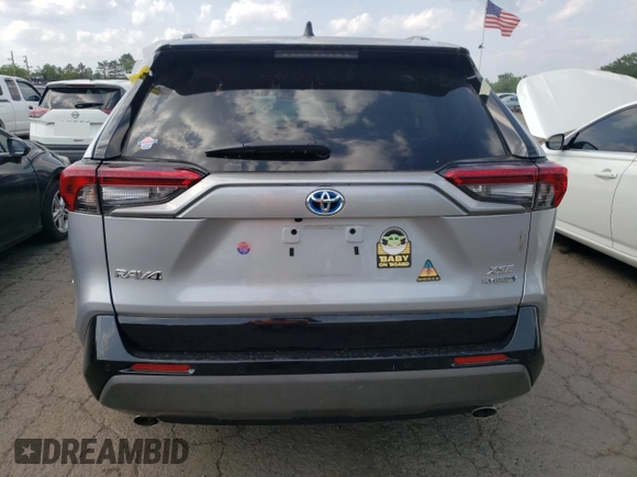 2021 Toyota RAV4 Hybrid XSE with VIN 4T3E6RFVXMU039871, listed as a Copart auction lot 61654295 with 30,775 mi miles and Salvage title. Bid and sale history available at DreamBid. Image 6.