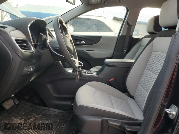 2020 Chevrolet Equinox LS z VIN 2GNAXSEV0L6202582, wystawiony jako Copart lot #84821374 z przebiegiem 56 524 mil mil oraz Szkoda całkowita • Salvage title. Historia ofert i sprzedaży dostępna na DreamBid. Obrazek 7.