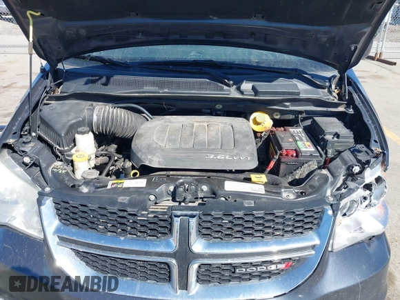2014 Dodge Grand Caravan SXT with VIN 2C4RDGCG1ER167624, listed as a IAAI auction lot 41888822 with 202,729 mi miles and . Bid and sale history available at DreamBid. Image 10.