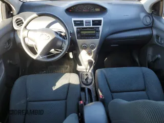2009 Toyota Yaris with VIN JTDBT903891323833, listed as a Copart auction lot 47460975 with 134,524 mi miles and Salvage Title. Bid and sale history available at DreamBid. Image 8.
