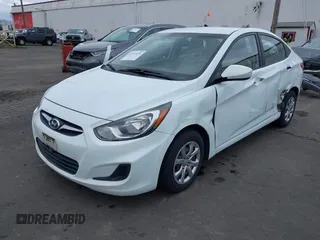 2013 Hyundai Accent GLS with VIN KMHCT4AE6DU291877, listed as a IAAI auction lot 41931876 with 136,781 mi miles. Bid and sale history available at carsss.com. Image 2.
