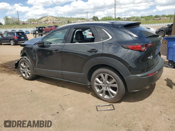 2023 Mazda CX-30 S Premium with VIN 3MVDMBDMXPM527113, listed as a Copart auction lot 57169165 with 49,040 mi miles and Salvage title. Bid and sale history available at DreamBid. Image 2.