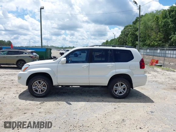 2005 Lexus GX 470 z VIN JTJBT20X350075577, wystawiony jako IAAI lot #42534615 z przebiegiem 233 329 mil mil oraz . Historia ofert i sprzedaży dostępna na DreamBid. Obrazek 14.