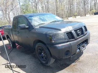 2005 Nissan Titan XE with VIN 1N6BA06A35N569289, listed as a IAAI auction lot 41985387 with 227,117 mi miles. Bid and sale history available at carsss.com. Image 1.