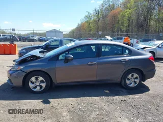 2014 Honda Civic LX with VIN 2HGFB2F50EH513868, listed as a IAAI auction lot 41986283 with 160,391 mi miles and . Bid and sale history available at DreamBid. Image 14.