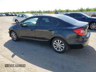 2012 Honda Civic EX with VIN 2HGFB2F84CH605329, listed as a Copart auction lot 52017085 with 102,362 mi miles and Salvage Title. Bid and sale history available at DreamBid. Image 2.
