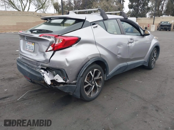 2018 Toyota C-HR XLE with VIN JTNKHMBX5J1011568, listed as a IAAI auction lot 42043867 with 30,699 mi miles. Bid and sale history available at carsss.com. Image 4.