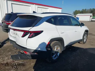2022 Hyundai Tucson SEL with VIN KM8JB3AE8NU033575, listed as a IAAI auction lot 41662009 with 54,971 mi miles. Bid and sale history available at carsss.com. Image 4.