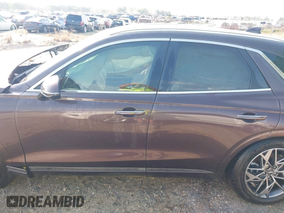 2022 Genesis GV70 2.5T with VIN KMUMADTB9NU050430, listed as a IAAI auction lot 41990564 with 36,308 mi miles and . Bid and sale history available at DreamBid. Image 14.