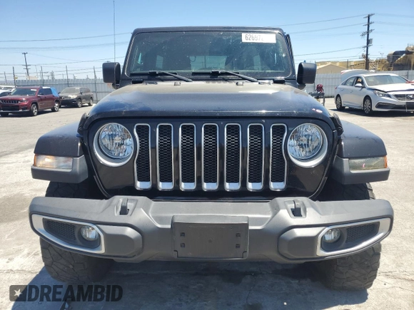 2020 Jeep Wrangler Unlimited Sahara with VIN 1C4HJXEN9LW247869, listed as a Copart auction lot 62697245 with 100,982 mi miles and Salvage title. Bid and sale history available at DreamBid. Image 5.