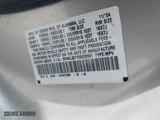 2005 Honda Odyssey EX-L with VIN 5FNRL38775B028551, listed as a IAAI auction lot 42011201 with 201,957 mi miles. Bid and sale history available at carsss.com. Image 9.
