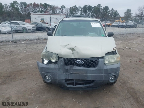 2005 Ford Escape XLT with VIN 1FMYU93135DA07844, listed as a IAAI auction lot 41786019 with 118,840 mi miles. Bid and sale history available at carsss.com. Image 12.