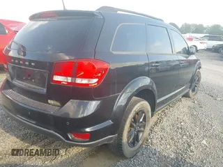 2019 Dodge Journey SE with VIN 3C4PDCBB8KT863492, listed as a IAAI auction lot 40446598 with Not provided miles and . Bid and sale history available at DreamBid. Image 4.