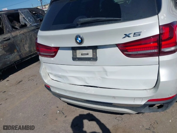 2017 BMW X5 sDrive35i with VIN 5UXKR2C38H0U21801, listed as a IAAI auction lot 41732946 with 195,822 mi miles. Bid and sale history available at carsss.com. Image 20.