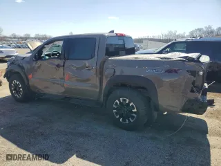 2024 Nissan Frontier PRO-4X with VIN 1N6ED1EK7RN610467, listed as a Copart auction lot 50138015 with 24,723 mi miles and Salvage Title. Bid and sale history available at carsss.com. Image 2.