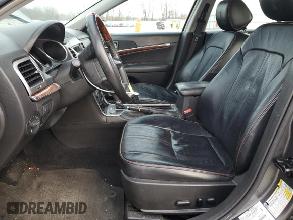 2012 Lincoln MKZ with VIN 3LNHL2GC7CR808710, listed as a Copart auction lot 45540355 with 128,774 mi miles and Salvage Title. Bid and sale history available at DreamBid. Image 7.
