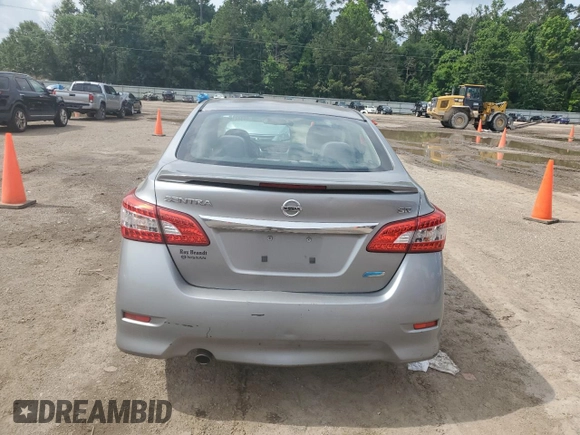 2014 Nissan Sentra SR z VIN 3N1AB7APXEY259601, wystawiony jako Copart lot #59144195 z przebiegiem 99 834 mil mil oraz Szkoda całkowita • Salvage title. Historia ofert i sprzedaży dostępna na DreamBid. Obrazek 6.