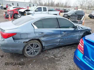 2015 Infiniti Q50 with VIN JN1BV7AR4FM406268, listed as a IAAI auction lot 41837888 with 211,965 mi miles. Bid and sale history available at carsss.com. Image 14.