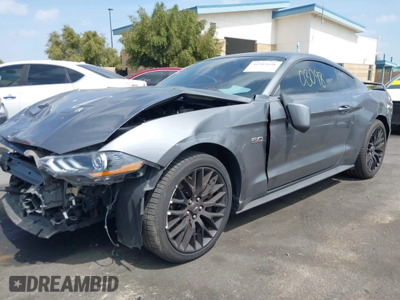 2021 Ford Mustang GT z VIN 1FA6P8CF0M5104894, wystawiony jako IAAI lot #41903098 z przebiegiem 38 794 mil mil oraz . Historia ofert i sprzedaży dostępna na DreamBid. Obrazek 19.