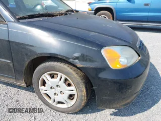 2001 Honda Civic LX z VIN 2HGES16521H558942, wystawiony jako IAAI lot #42409480 z przebiegiem 230 909 mil mil oraz . Historia ofert i sprzedaży dostępna na DreamBid. Obrazek 16.