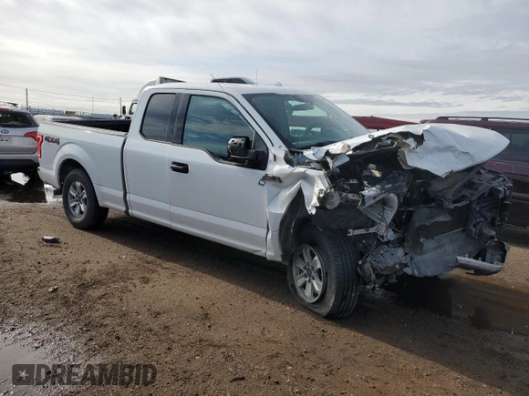 2015 Ford F-150 XLT with VIN 1FTFX1EF6FFA30750, listed as a Copart auction lot 60123375 with 210,315 mi miles and Salvage title. Bid and sale history available at DreamBid. Image 4.