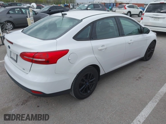 2017 Ford Focus SE z VIN 1FADP3F26HL233226, wystawiony jako IAAI lot #42004148 z przebiegiem 75 180 mil mil oraz . Historia ofert i sprzedaży dostępna na DreamBid. Obrazek 4.