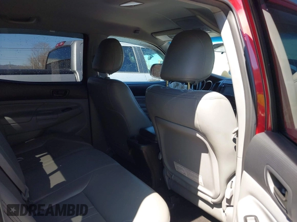 2014 Toyota Tacoma with VIN 5TFLU4EN4EX095917, listed as a IAAI auction lot 41820691 with 59,823 mi miles and . Bid and sale history available at DreamBid. Image 8.
