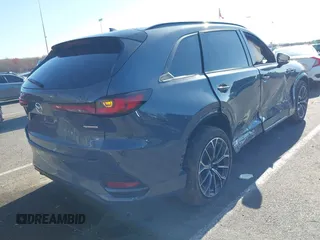 2025 Mazda CX-70 S Premium with VIN JM3KJDHC8S1102288, listed as a IAAI auction lot 41994535 with 2,122 mi miles and . Bid and sale history available at DreamBid. Image 4.