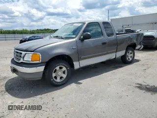 2004 Ford F-150 XL with VIN 2FTRX17274CA98376, listed as a Copart auction lot 56300585 with 71,767 mi miles and Salvage title. Bid and sale history available at DreamBid. Image 1.